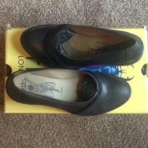 Fly London black leather wedge size 39.